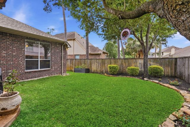 82 S Rocky Point Circle, The Woodlands, TX 77389