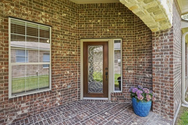 82 S Rocky Point Circle, The Woodlands, TX 77389
