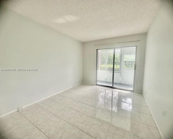801 SW 133rd Terrace 105K, Pembroke Pines, FL 33027