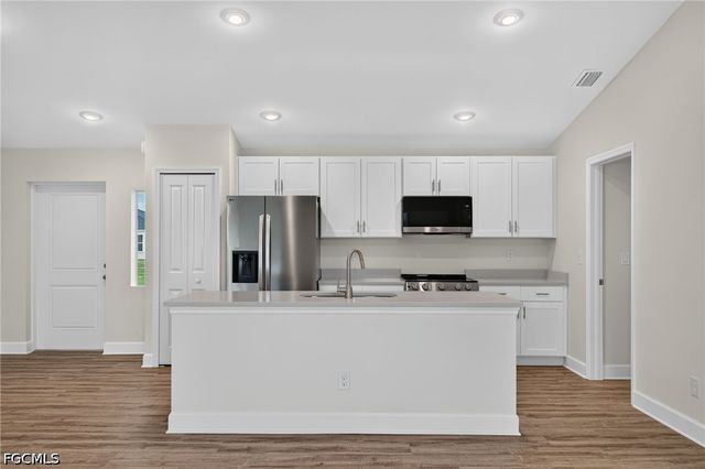 411 NW 11th ST, Cape Coral, FL 33993