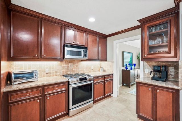 6919 Rustling Oaks Drive, Richmond, TX 77469