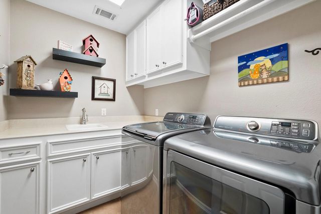 6919 Rustling Oaks Drive, Richmond, TX 77469