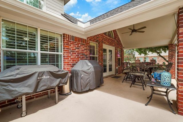 6919 Rustling Oaks Drive, Richmond, TX 77469