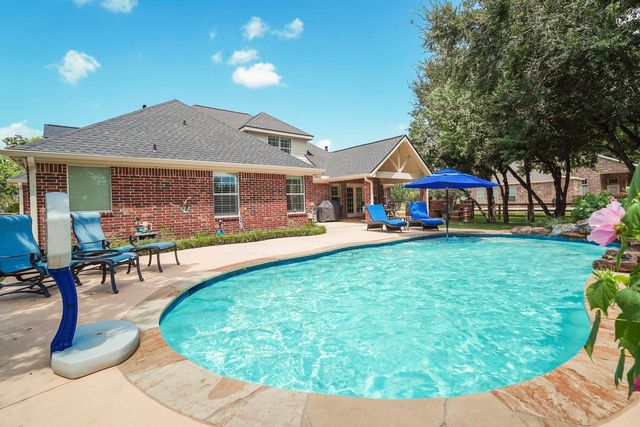 6919 Rustling Oaks Drive, Richmond, TX 77469