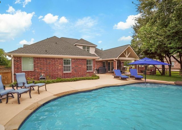 6919 Rustling Oaks Drive, Richmond, TX 77469