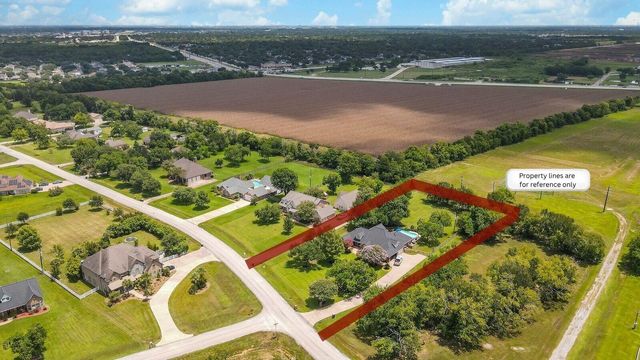 6919 Rustling Oaks Drive, Richmond, TX 77469