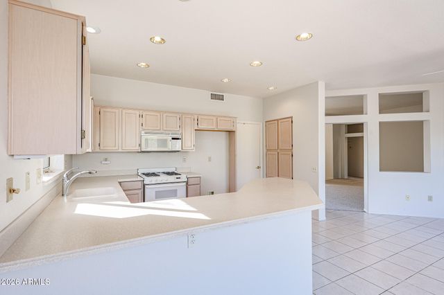 14104 W GUNSIGHT Drive, Sun City West, AZ 85375