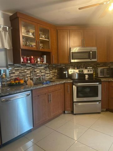 3 Greenway Village N 202, Royal Palm Beach, FL 33411