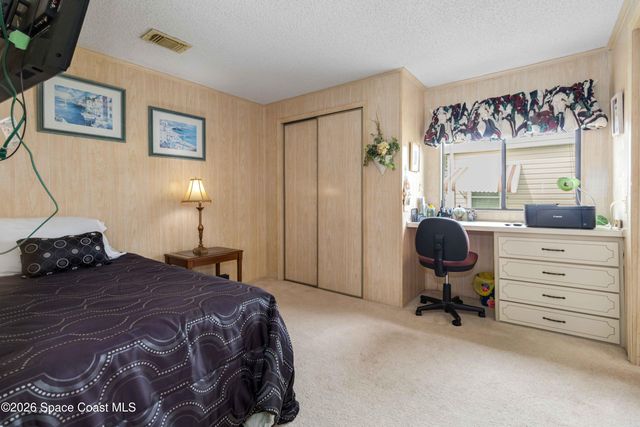 703 Amaryllis Drive, Barefoot Bay, FL 32976