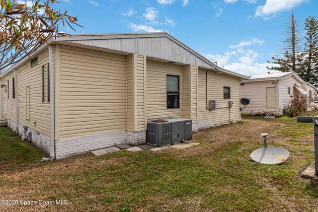 703 Amaryllis Drive, Barefoot Bay, FL 32976