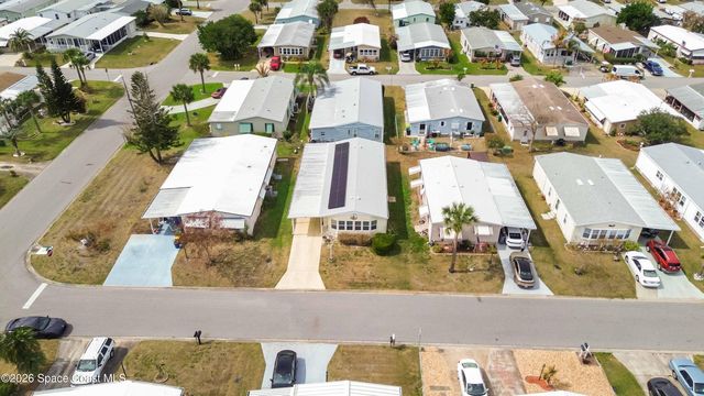 703 Amaryllis Drive, Barefoot Bay, FL 32976