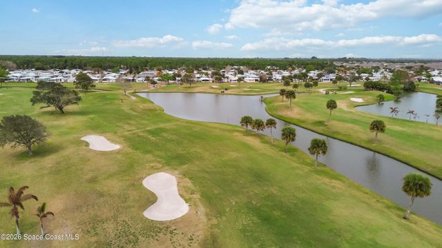 703 Amaryllis Drive, Barefoot Bay, FL 32976