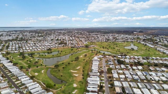 703 Amaryllis Drive, Barefoot Bay, FL 32976