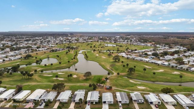 703 Amaryllis Drive, Barefoot Bay, FL 32976