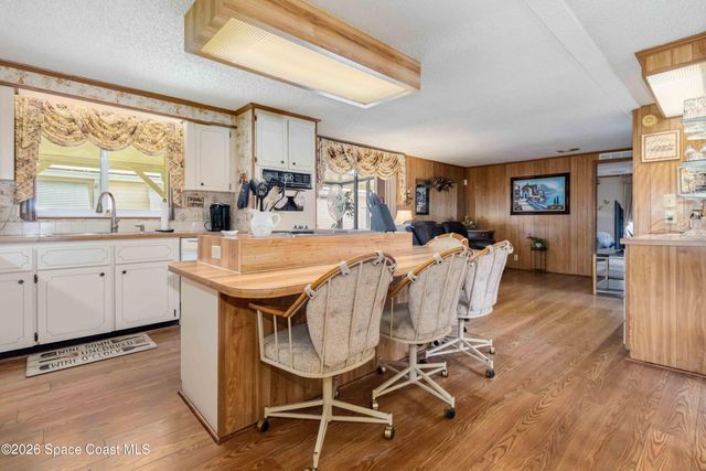 703 Amaryllis Drive, Barefoot Bay, FL 32976