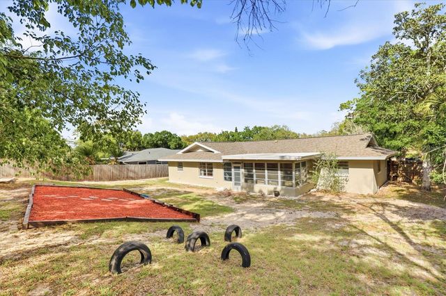 1143 LANCER LANE, Tarpon Springs, FL 34689