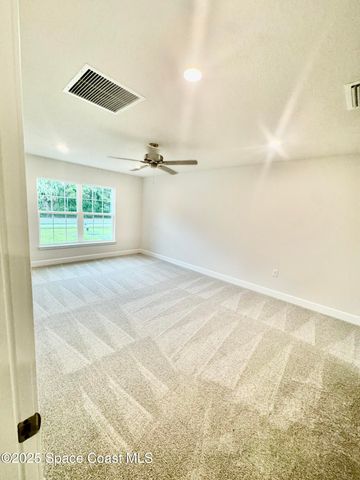 725 De Groodt Road SW, Palm Bay, FL 32908