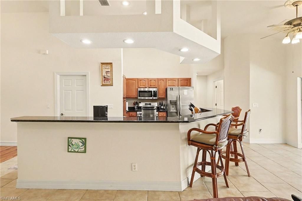 Image 4 of property listing at 5413 SW 24th PL, Cape Coral, FL 33914