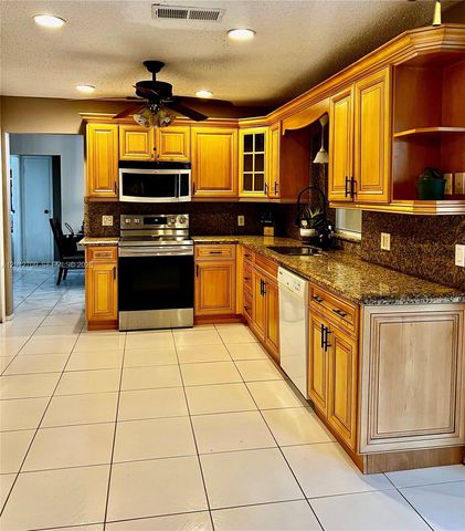 8350 NW 27th Pl, Sunrise, FL 33322