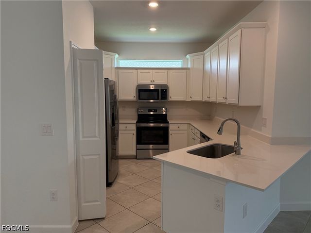 9093 Leatherwood LOOP, Lehigh Acres, FL 33936
