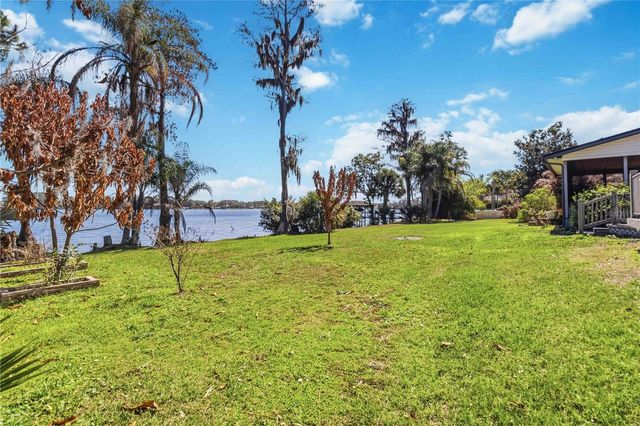 7468 LAKE WILLIS DRIVE, Orlando, FL 32821