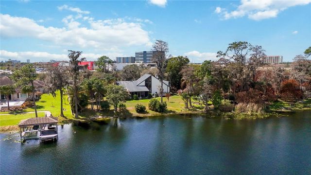 7468 LAKE WILLIS DRIVE, Orlando, FL 32821