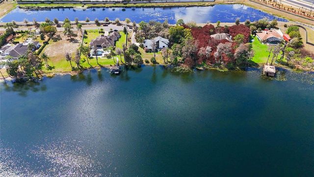 7468 LAKE WILLIS DRIVE, Orlando, FL 32821
