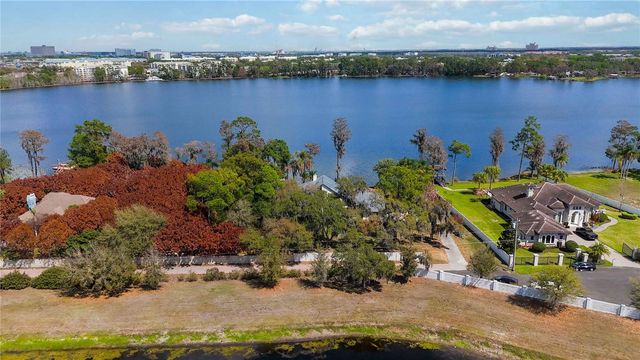 7468 LAKE WILLIS DRIVE, Orlando, FL 32821