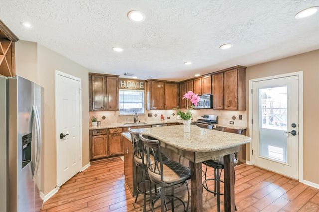 11935 Belle Court, Pinehurst, TX 77362