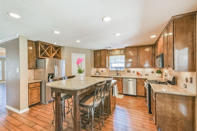 11935 Belle Court, Pinehurst, TX 77362
