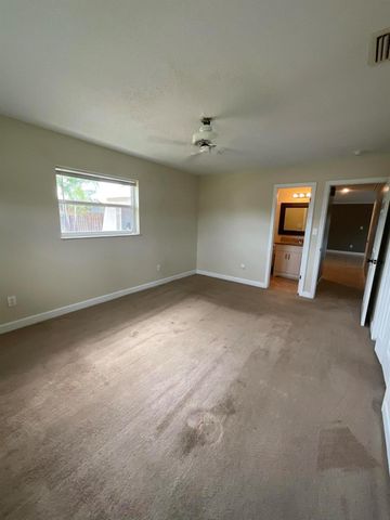 452 SW Curry Street, Port St Lucie, FL 34983