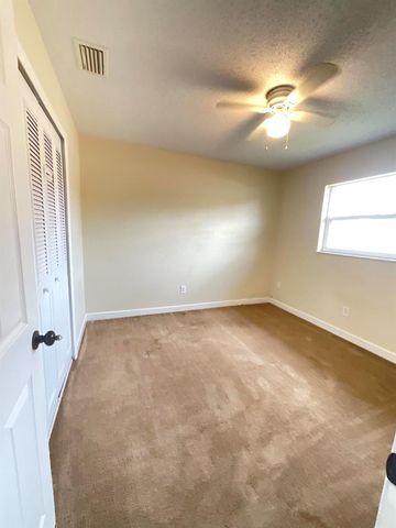 452 SW Curry Street, Port St Lucie, FL 34983