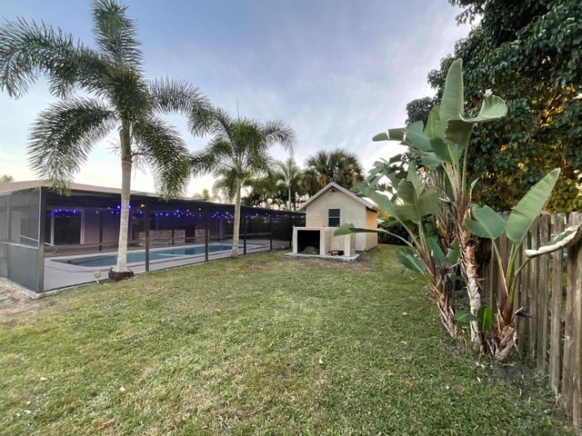 452 SW Curry Street, Port St Lucie, FL 34983