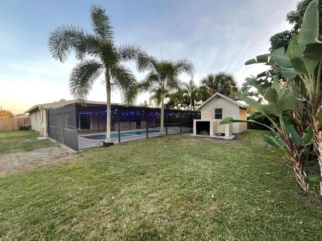 452 SW Curry Street, Port St Lucie, FL 34983