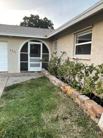 452 SW Curry Street, Port St Lucie, FL 34983