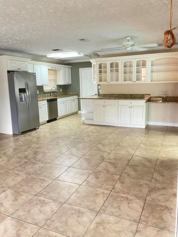 452 SW Curry Street, Port St Lucie, FL 34983