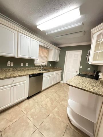 452 SW Curry Street, Port St Lucie, FL 34983