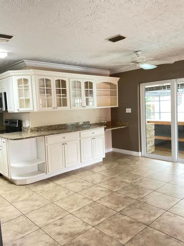 452 SW Curry Street, Port St Lucie, FL 34983