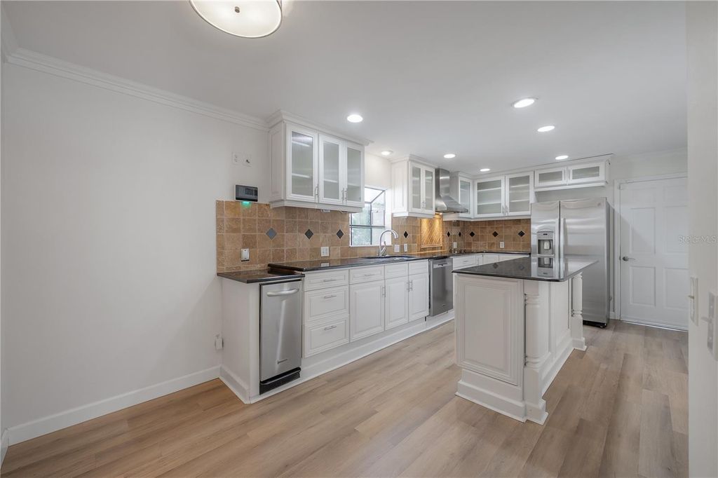 Image 6 of property listing at 5026 CYPRESS TRACE DRIVE, Tampa, FL 33624