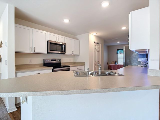 1049 TROPICAL AVENUE NW, Port Charlotte, FL 33948