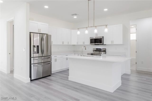 714 Anaconda AVE S, Lehigh Acres, FL 33974