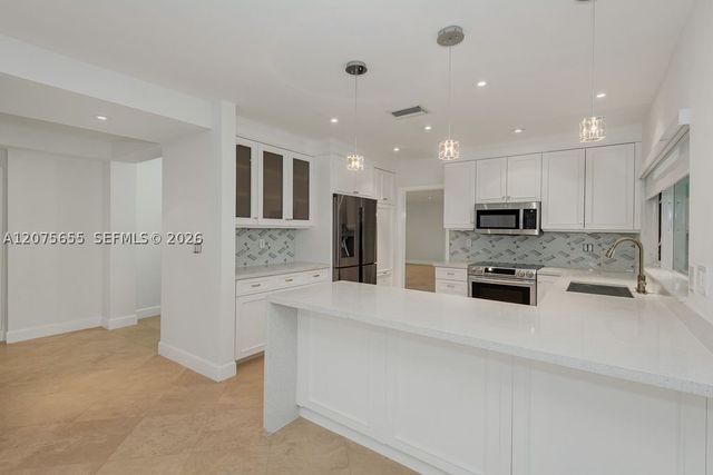 6931 Loch Ness Dr, Miami Lakes, FL 33014