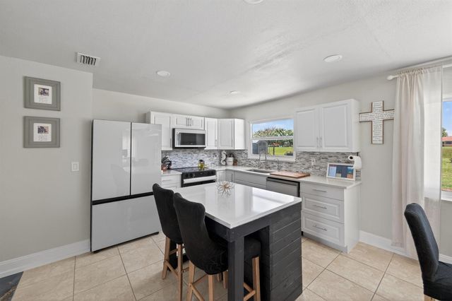 264 SW Cherryhill Road, Port St. Lucie, FL 34953