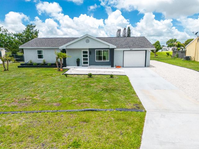264 SW Cherryhill Road, Port St. Lucie, FL 34953