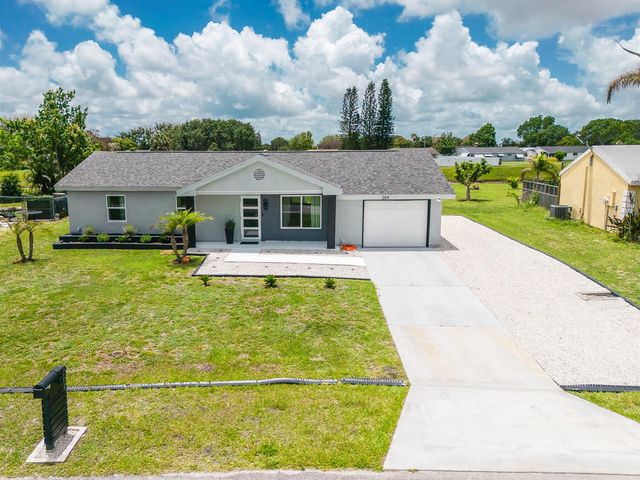 264 SW Cherryhill Road, Port St. Lucie, FL 34953