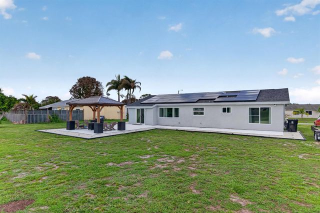 264 SW Cherryhill Road, Port St. Lucie, FL 34953
