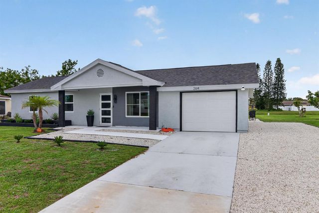 264 SW Cherryhill Road, Port St. Lucie, FL 34953