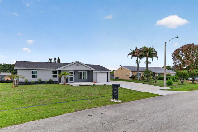 264 SW Cherryhill Road, Port St. Lucie, FL 34953