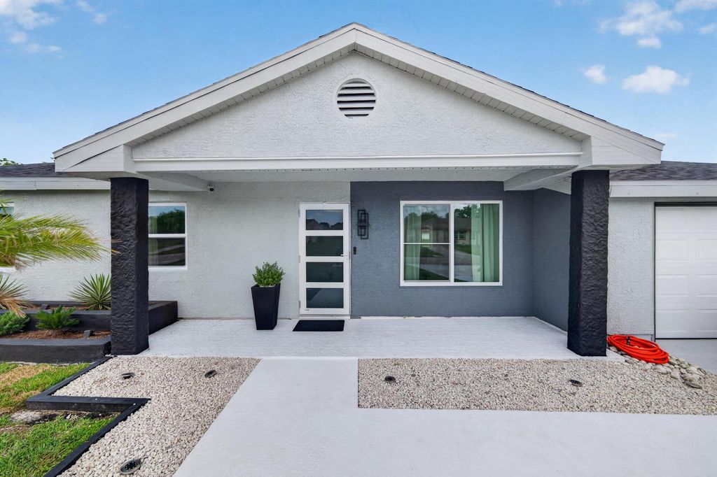 264 SW Cherryhill Road, Port St. Lucie, FL 34953