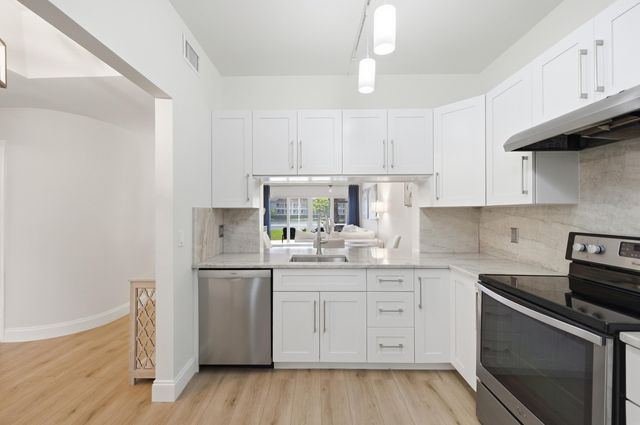 115 Cypress Point Drive, Palm Beach Gardens, FL 33418